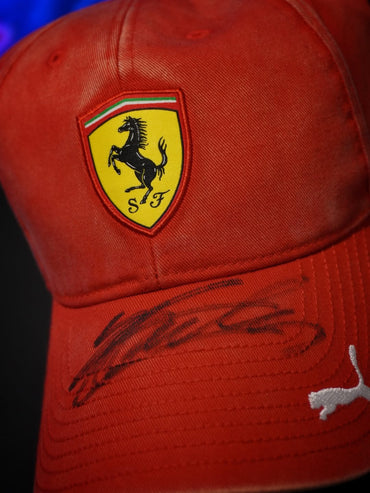 Ferrari Formula 1 red cap with Scuderia Ferrari logo and signature on the brim